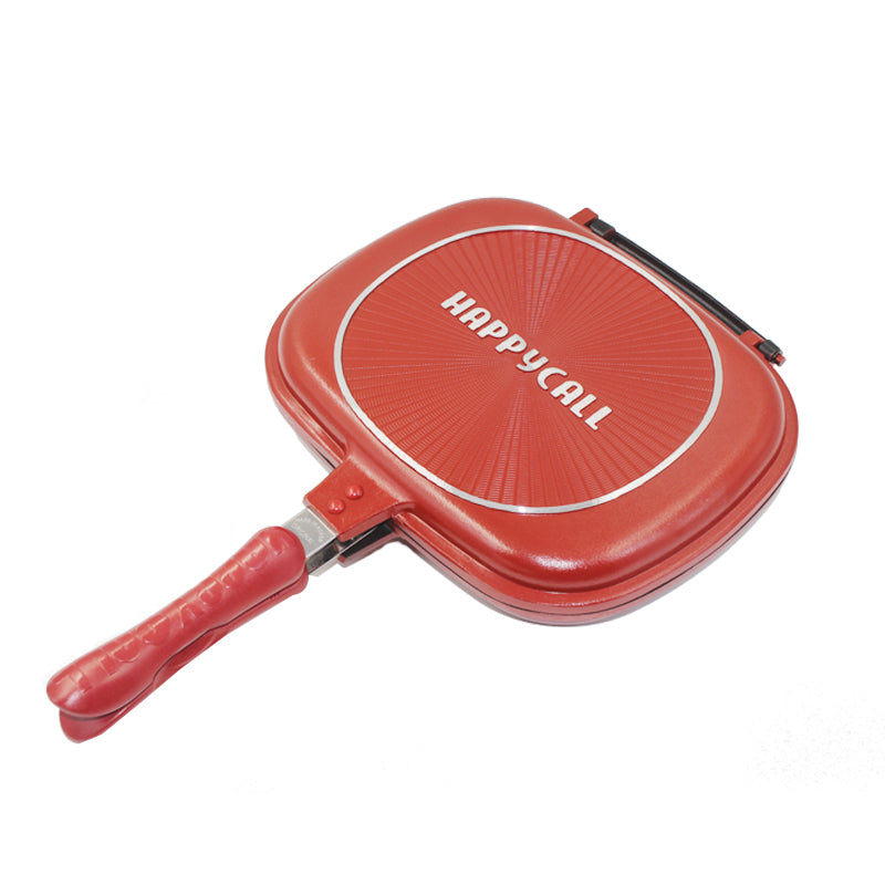 Tigaie Grill dubla din Aluminiu cu interior ceramic , cu manerele prevazute cu magneti pentru inchidere.
